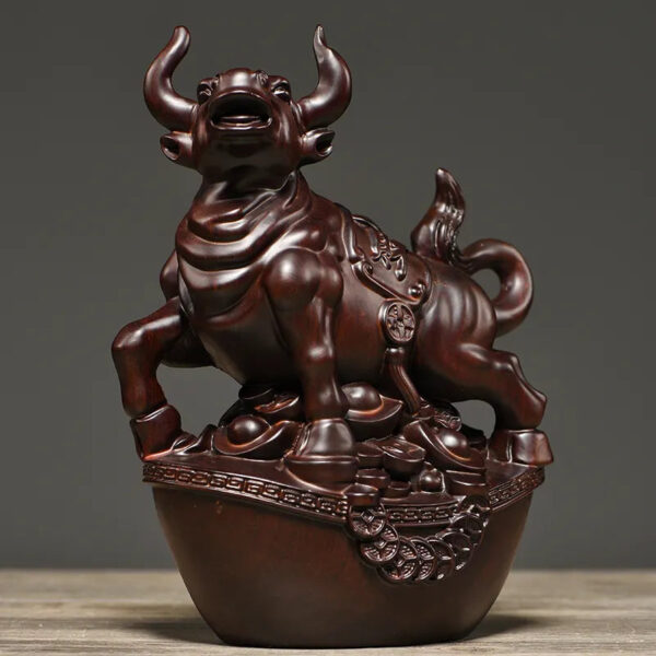 Solid ebony wood carving of the twelve Chinese zodiac animals, solid wood ox ornaments. It is a modern handicraft gift for home decoration in the living room or for office use.