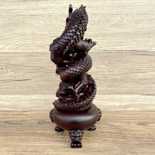 The Ebony Wood Carving Dragon Coiling around the Chinese Dragon Head and Censer Ornament with Treasure Basin, a Wooden Decoration for the Living Room.