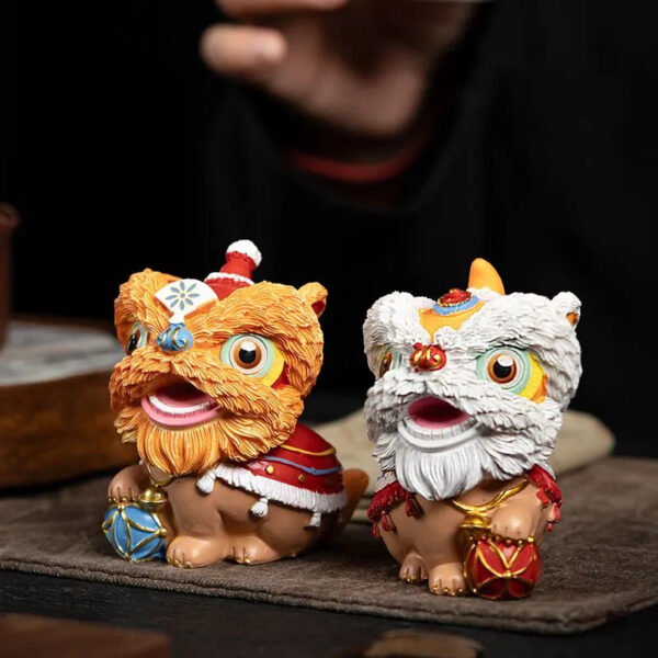 5f1aba16-9bad-494a-946f-1d648fbc95e9.jpeg.a.jpg The new Chinese trendy resin tea pet of waking lion, Forbidden City fortune-telling tea tray ornament, desktop and living room cultural and creative lion dance entrance decoration.