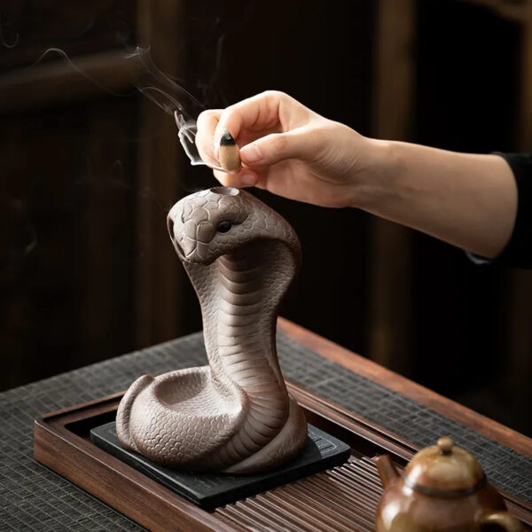 700e5f32-42c6-4991-837a-5066b08c9d3b.jpg Reverse incense burner, creative ceramic Chinese zodiac snake ornament for incense ceremony with old clay and spirit snake design, suitable for household use with sandalwood and agarwood incense