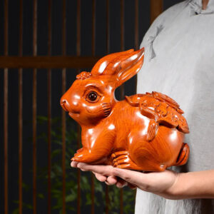 73c61c4715e97f2035b167a2f8ec7966.jpg A rabbit woodcarving ornament, a real wood-carved animal of the Chinese zodiac, a handicraft gift for home, study, office desktop and girlfriend.
