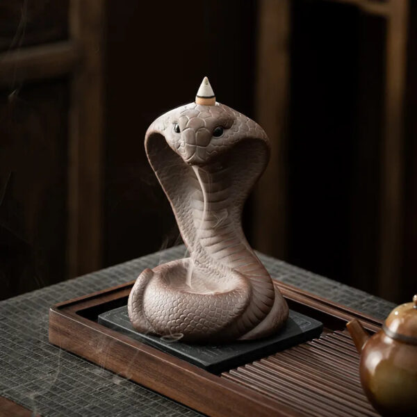 7e770974-5414-46b4-8517-d7c6ab73499f.jpg Reverse incense burner, creative ceramic Chinese zodiac snake ornament for incense ceremony with old clay and spirit snake design, suitable for household use with sandalwood and agarwood incense