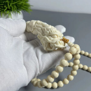 8858f7bf-35ef-4434-8841-4a72adc1360e.jpg Mammoth Ivory - carved Dragon Tooth Pendants, made from mammoth tusk tips. These