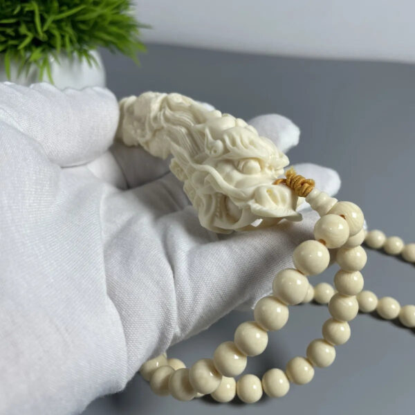 Mammoth Ivory - carved Dragon Tooth Pendants, made from mammoth tusk tips. These