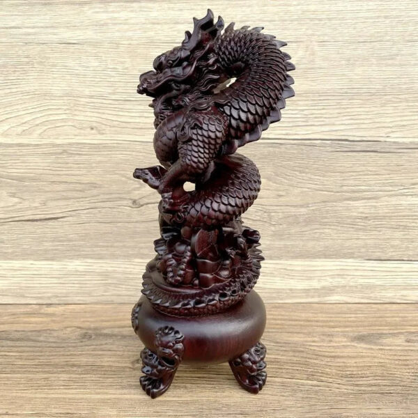 The Ebony Wood Carving Dragon Coiling around the Chinese Dragon Head and Censer Ornament with Treasure Basin, a Wooden Decoration for the Living Room.