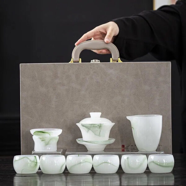d71c92c7-91a4-402e-86ec-175ebe5e2c76.jpg High-end light luxury jade porcelain ink wash glass tea set, kung fu tea cups, office white jade, household and gift-giving covered bowl