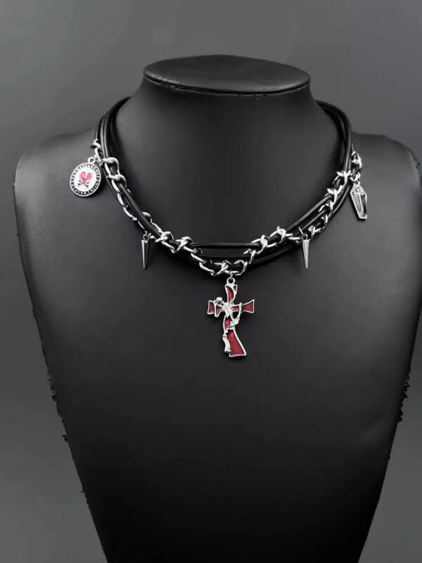 AVA's original irregular cross - shaped dark - colored rivet multi - layer winding necklace. It features a niche design and belongs to the sub - cultural Y2K