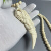Mammoth Ivory - carved Dragon Tooth Pendants, made from mammoth tusk tips. These