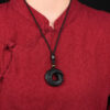 Natural Obsidian "Turning Fortune" Pendant, Peace - buckle - shaped with Hanging Cord. This genuine ice - type jade pendant is a men's necklace made of high - quality crystal.