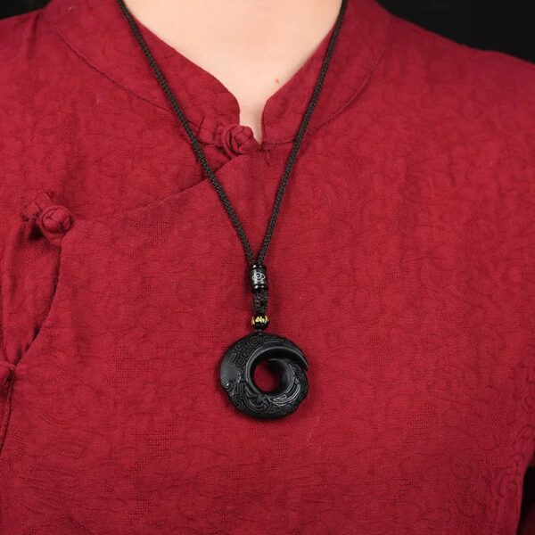 Natural Obsidian "Turning Fortune" Pendant, Peace - buckle - shaped with Hanging Cord. This genuine ice - type jade pendant is a men's necklace made of high - quality crystal.