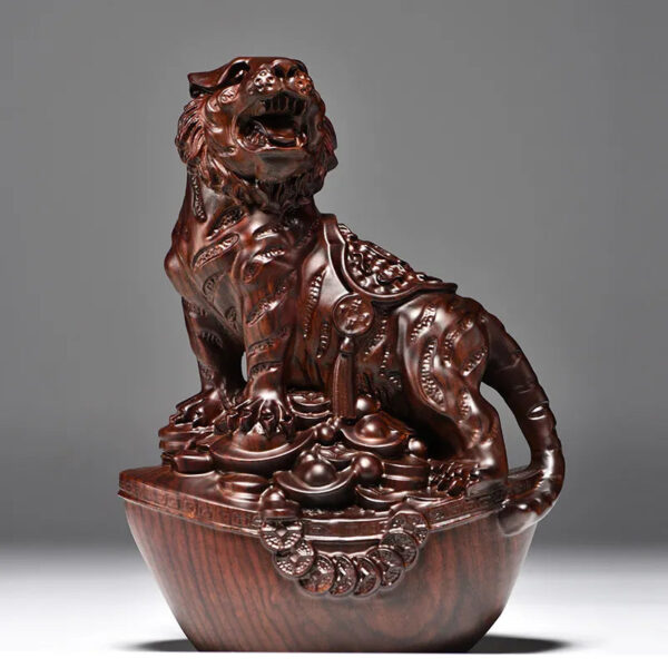 Mahogany carving tiger ornaments, for home decoration in the living room. It's the tiger among the twelve Chinese zodiac animals, which can safeguard the house, attract wealth and serve as tabletop decorations for gifts. They are solid wood handicrafts.