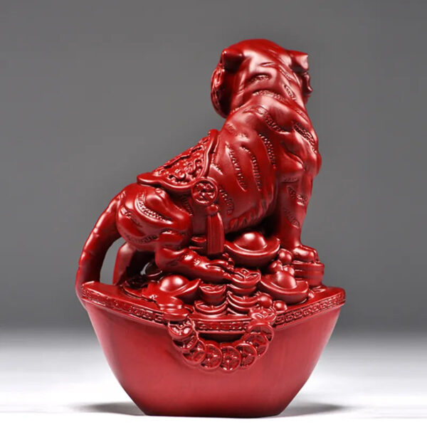 Mahogany carving tiger ornaments, for home decoration in the living room. It's the tiger among the twelve Chinese zodiac animals, which can safeguard the house, attract wealth and serve as tabletop decorations for gifts. They are solid wood handicrafts.